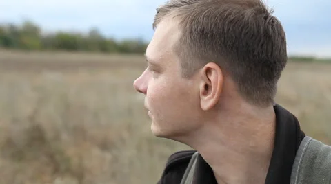 Man turns his head to the camera Stock Footage 40493797