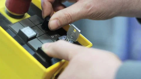 A man turns knobs on an industrial console. 스톡 동영상 129028998