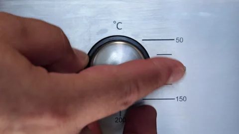 The Man Turns Off The Oven From The Maximum Temperature Stock Footage 250332863