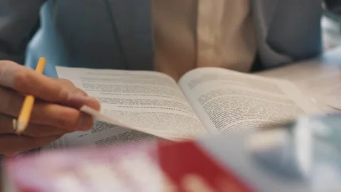 A man turns over the blank pages of the diary. Stock Footage 142256228