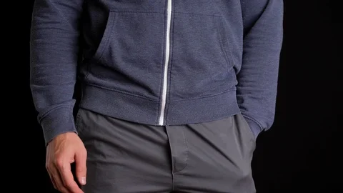 Man Turns the Pockets Inside Out. Video stock 119333019