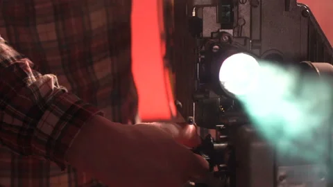 The man turns off the projector Stock-Footage 86229805