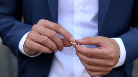 Man turns the ring on the finger Stock Footage 59629489