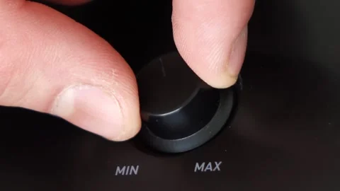 Man turns the sound down. close up Video stock 144653867