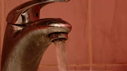 Man turns on the tap. Stock Footage 143297108