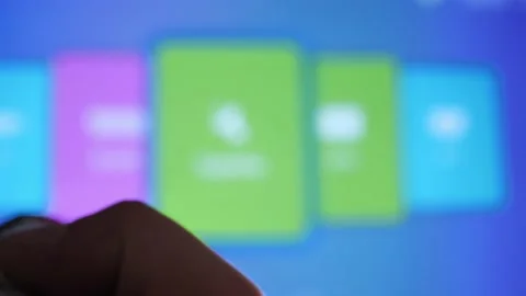 Man turns on the TV with a remote control. Stock Footage 151990633