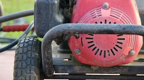 Man turns on two cycle engine Stock Footage 12127984