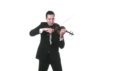 Man in a tuxedo performs a slow composition on a classical violin. Isolated Stock Footage 134495606