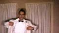 Man in Tuxedo Putting On Coat Formal 1960s Vintage Film Retro Home Movie 8550 HD Footage