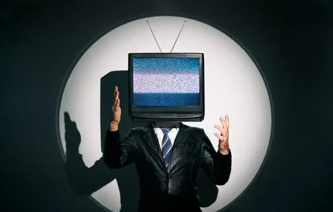 Man with TV instead of head. Media zombie concept Stock-Fotos