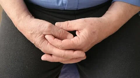 Man twiddles his thumbs Stock Footage 22359930