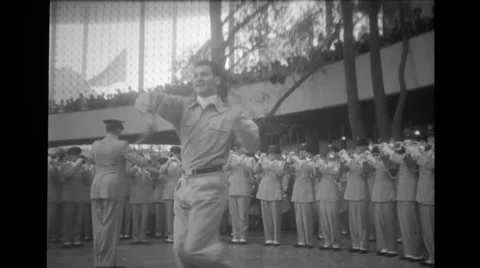 The man twirling baton with Air Force band playing at Brussels World's Fair Stock Footage