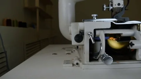 Man twists the button on the machine for the lower the edge of the skin Video stock 81418916