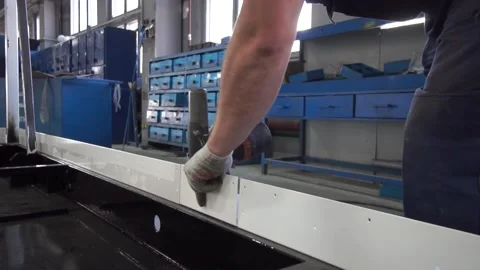 Man Twists the Screw With a Screwdriver. Stock Footage 169413824