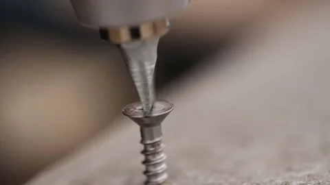 Man twists the screw with a screwdriver. Hand close-up Stock Footage 73615291