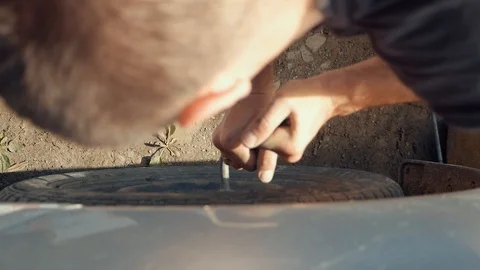 The man twists the wheel in the car Stock Footage 109061109