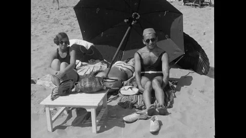 Man With Two Girls On The Beach Stock Footage 89939684
