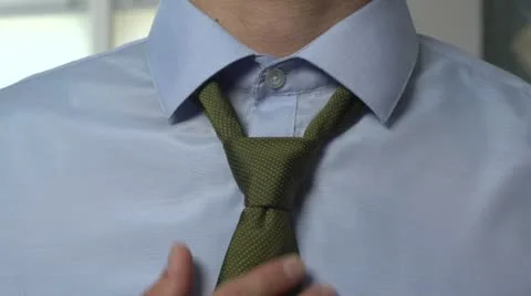 Man tying necktie, close up Stock Footage 12007203