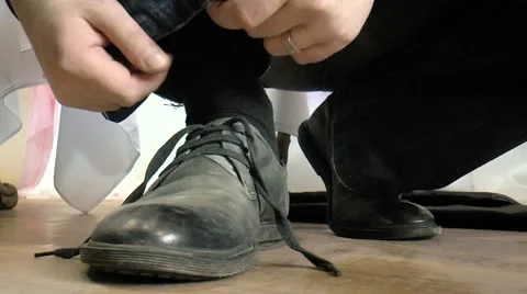 Man tying shoelaces Stock Footage 68290775