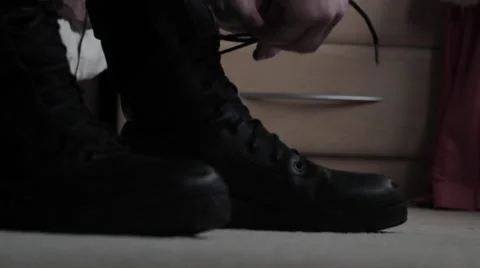 Man Tying Shoes, Boots Stock Footage 40485249