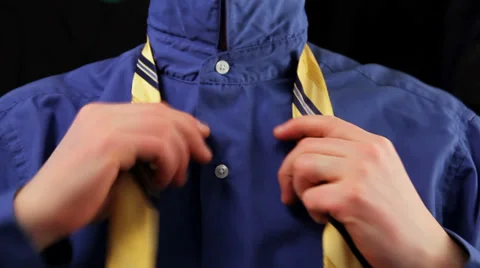Man tying a tie, close up Stock Footage 34485402