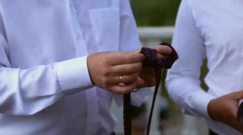 The man tying tie Stock Footage 67350169
