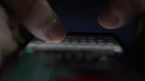Man type a message on his phone. phone message type in night. Video stock 237436710