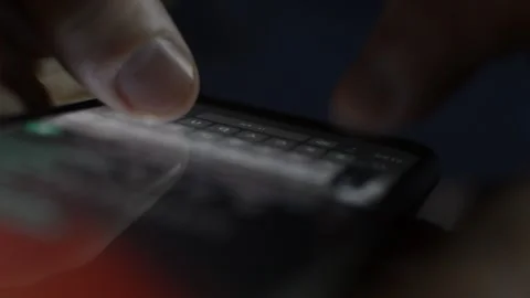 Man type a message on his phone. phone message type in night. Stock-Footage 237436863