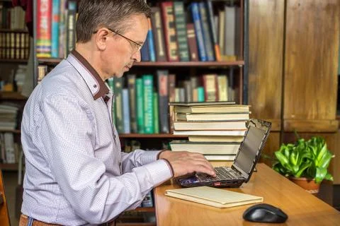 Man type something with his laptop Stock Photos