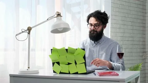 Man types and then presses the enter button and looks happily at the screen. Stock Footage 152647745