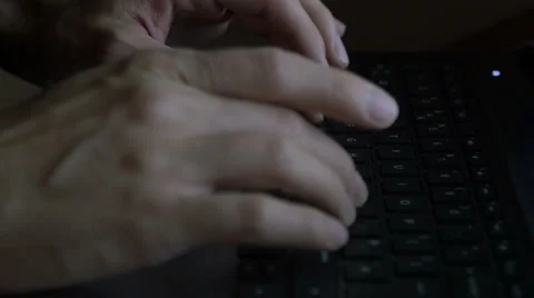 Man types on a computer Stock Footage 67654431
