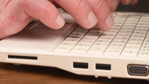 Man types on computer keyboard Stock Footage 105156385
