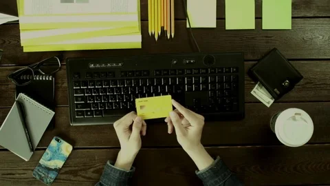 A man types on a computer keyboard on his desk. Stock Footage 82010255