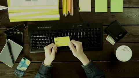 A man types on a computer keyboard on his desk. Stock Footage 82010409