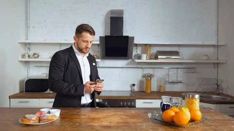 Man types e-mail on his cell phone Stock Footage 107388732