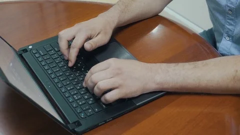Man types on laptop close-up Stock Footage 79101801