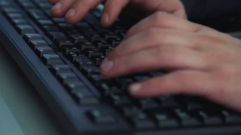 The man types the text Stock Footage 76000121