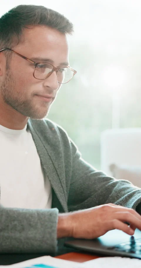 Man, typing and remote work in home office with laptop, data analysis report and Stock Footage 341425986