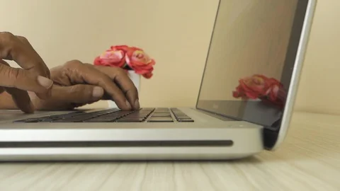 Man typing on Apple MacBook Pro laptop computer Stock Footage 114650533