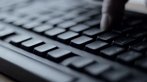 Man typing on black computer keyboard Stock Footage 33870117