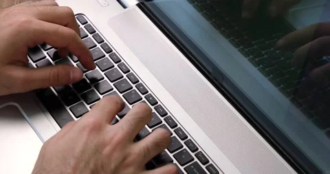 Man typing on a black keyboard close up Stock Footage 133918128