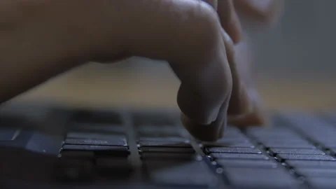 Man typing on black keyboard Stock Footage 90023308