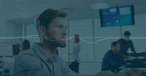 Man typing business data hearing incoming call and grabbing handset while 動画素材 310385032