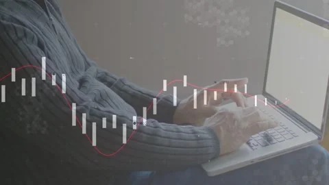 Man typing as candlestick bars and red trend line appearing, hands gesturing to Stock Footage 332566334