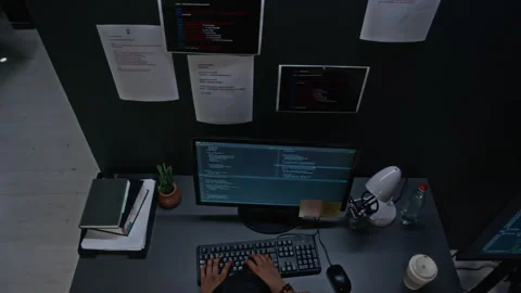 Man Typing Code on Computer Keyboard at Dark Office Stockbeeldmateriaal 348373218