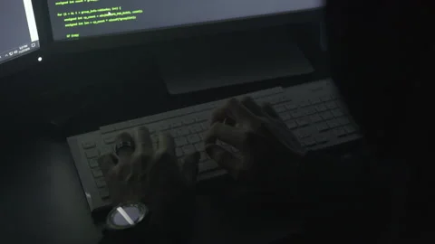 Man Typing Code in the Dark Stock Footage 208746245