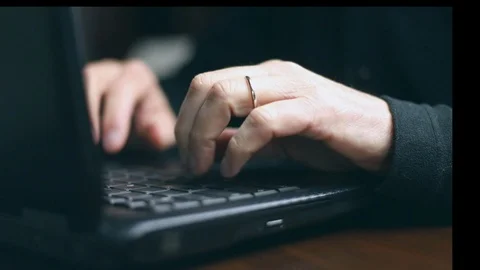 Man typing on the computer for conceptual use. Cinematic style clips 스톡 동영상 129611326