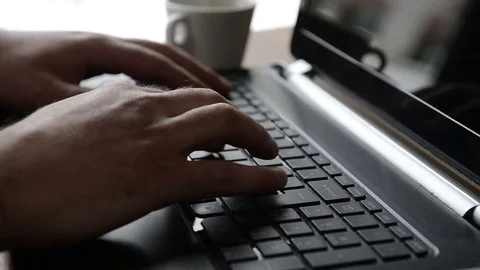 Man is typing on a computer Stock Footage 79028819