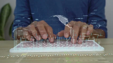 A man typing computer keyboard for analysis business data hologram. 库存影片 170538397