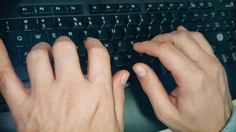 Man Typing On Computer Keyboard with both hands Stock Footage 86422484
